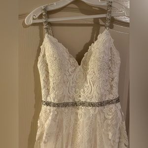 Used. No damage. Only alterations on the straps. Says 10, fits like a normal 6.